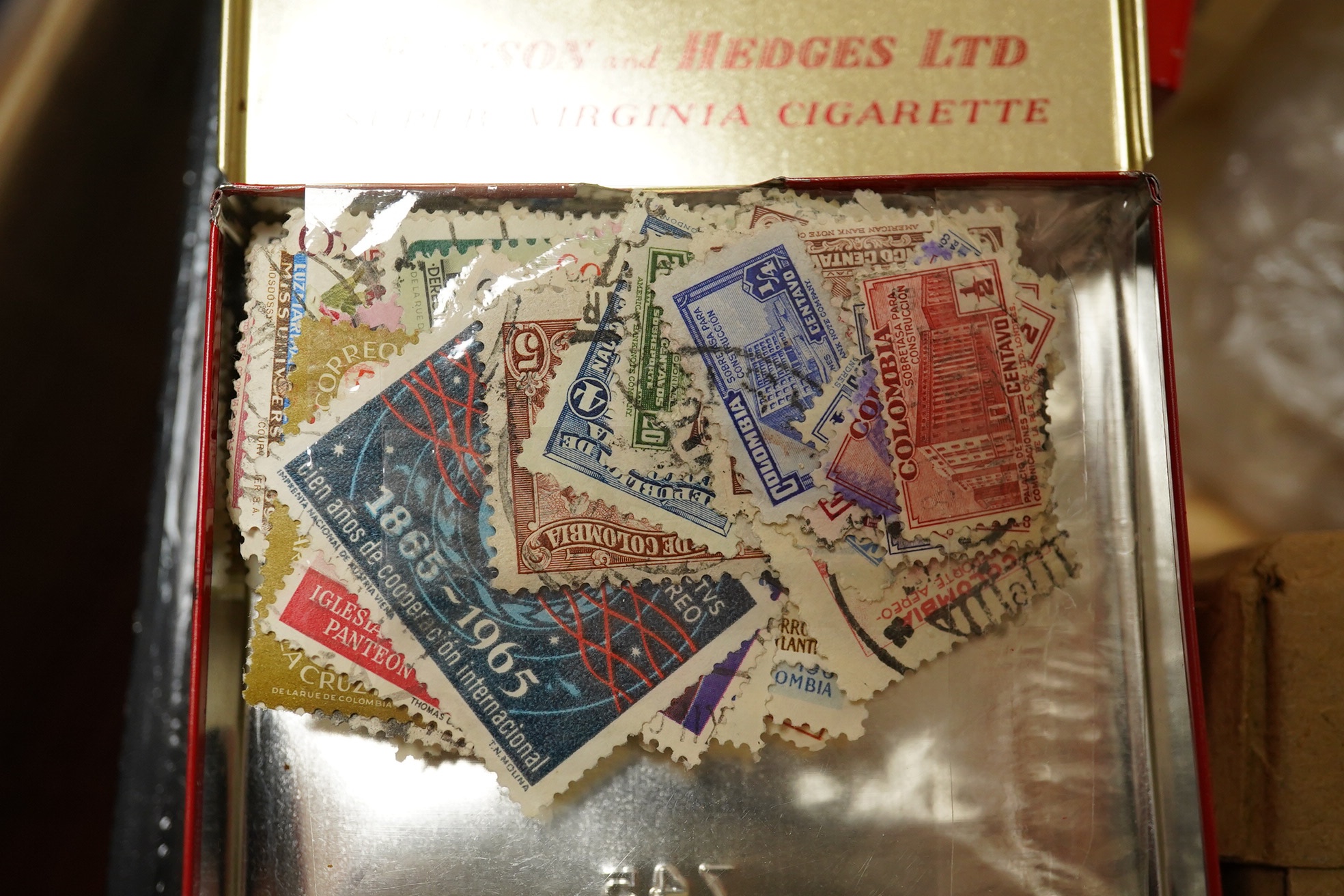 A collection of mostly British stamps in stock books including Mint, Definitives etc.